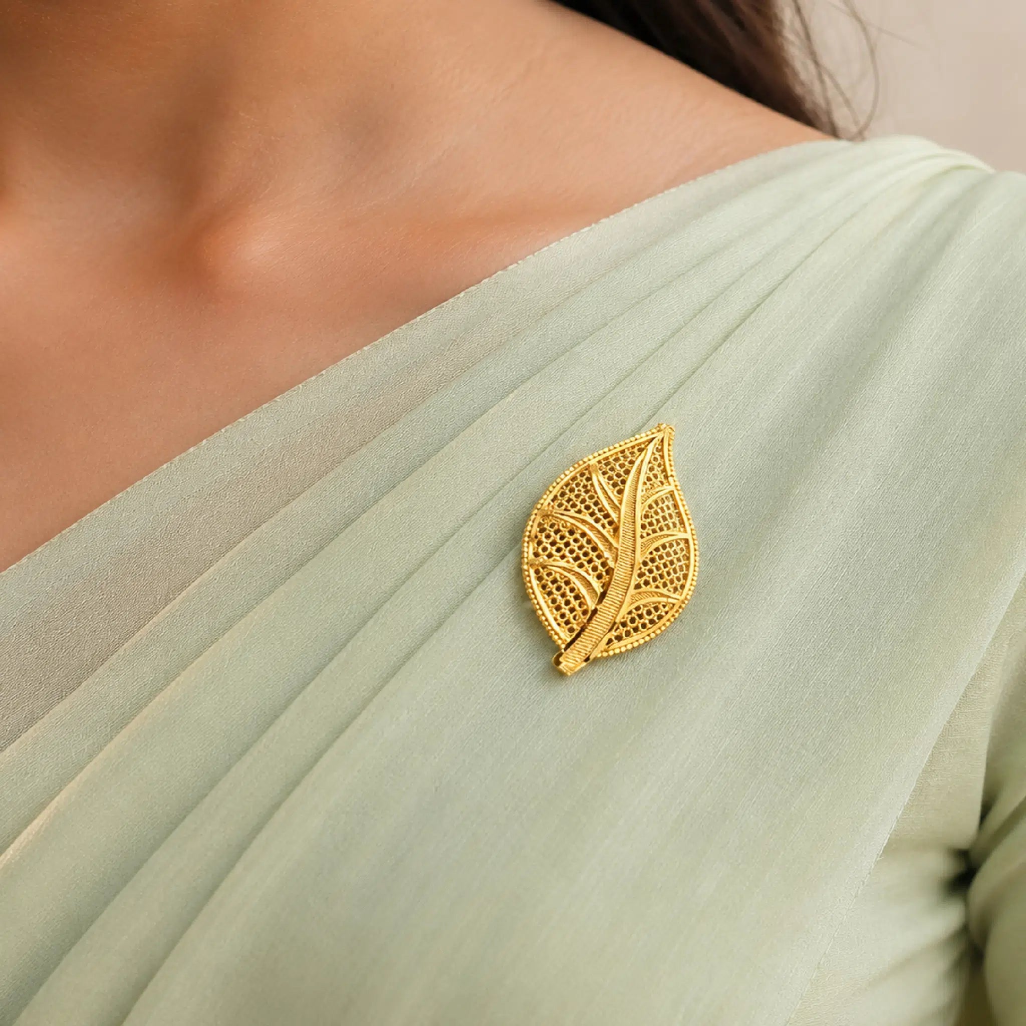 Gold Plated Leaf Motif Unisex Brooch on saree DBR42